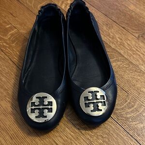Tory Burch Black Flats with Gold Emblem